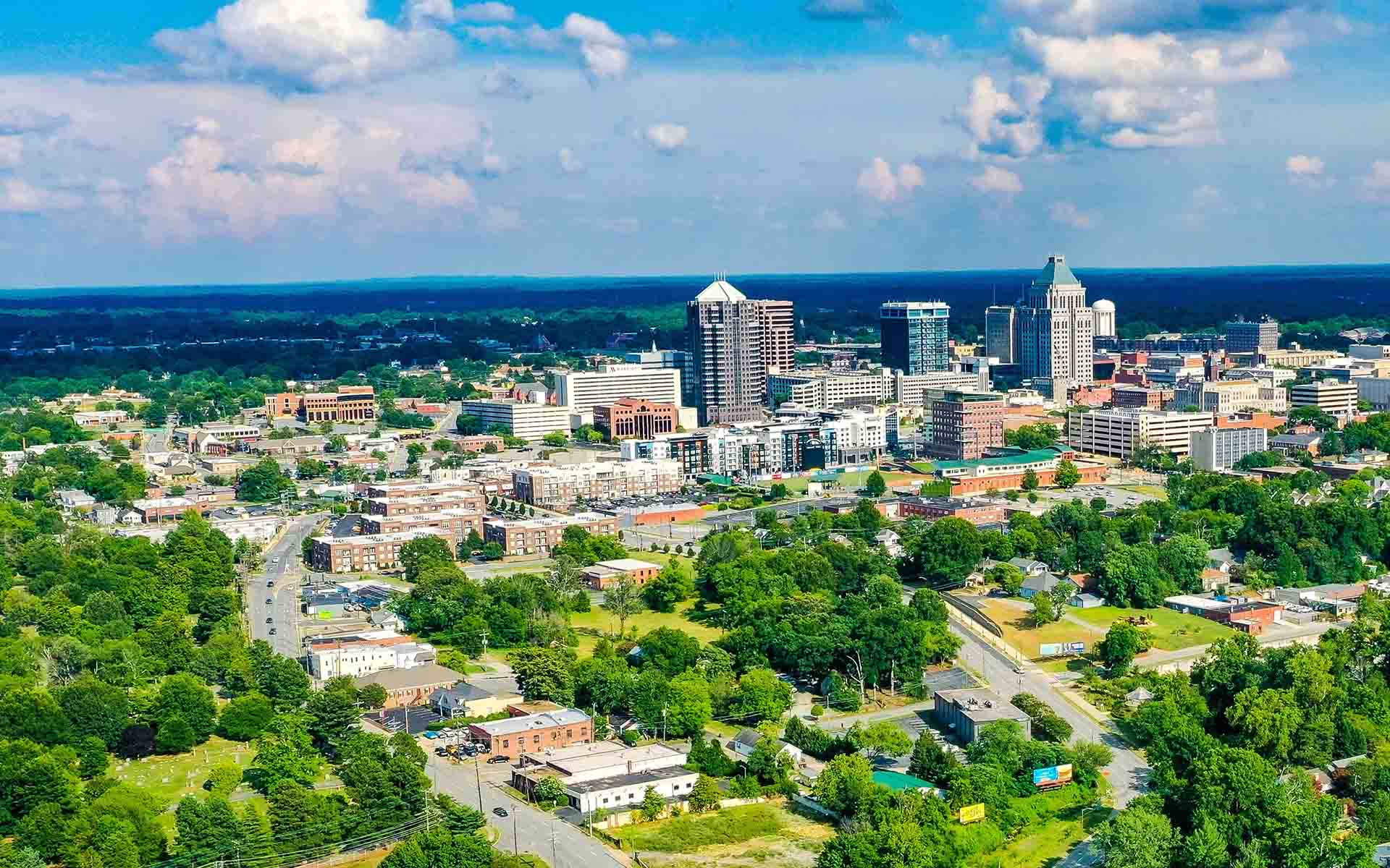Contact - Aerial View of a City in North Carolina on a Beautiful Day